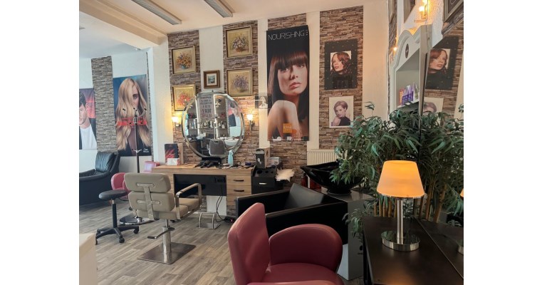 Theos friseursalon Bild 1